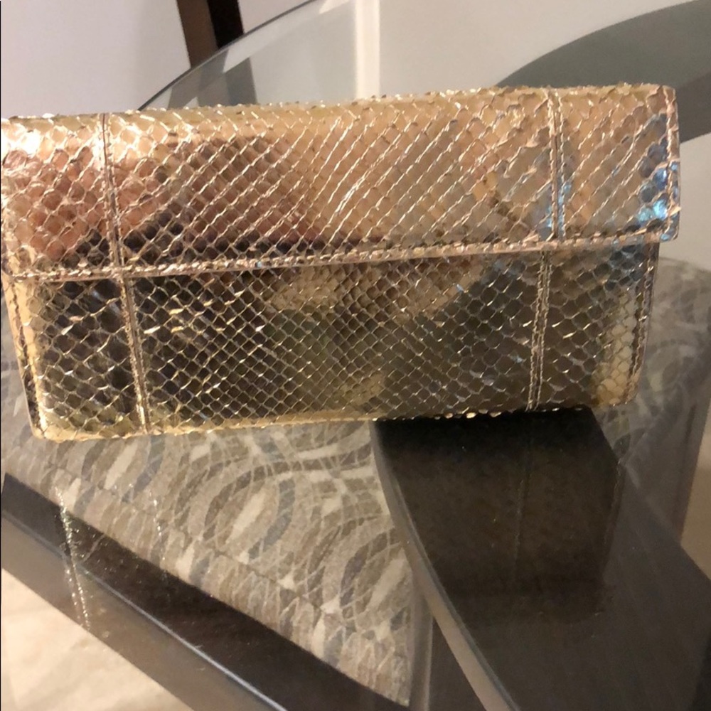Nancy Gonzales snake skin gold clutch